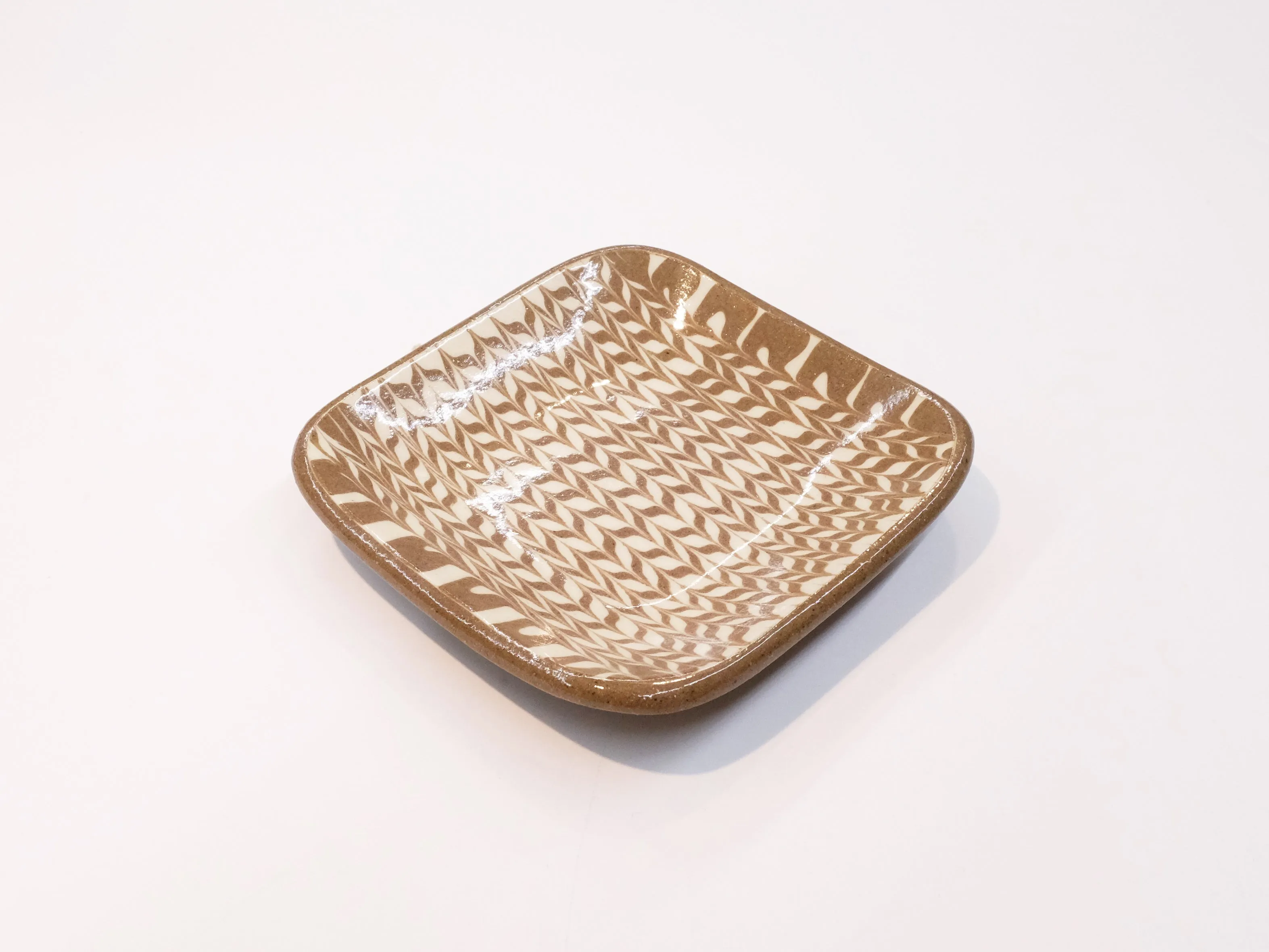 Small Square Plates by Giran Sagawa